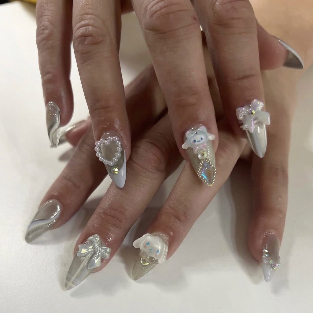 Silver chrome nails with crystal bows and character charms